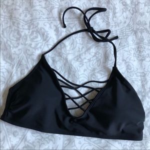 Black bikini top with cross cross detailing